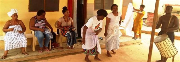 Women dancing at a traditional ceremony
