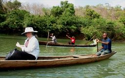 entering canoe for hippo safari in Ghana