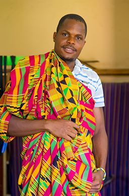 Handome man wearing Kente cloth