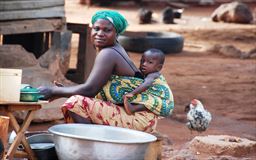 Woman with baby on back in northern Ghana