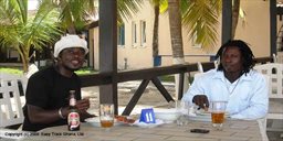 two men sitting at a table