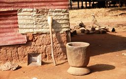 mortar and pestle in a village, Ghana