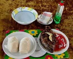 Banku and Tilapia with red pepper