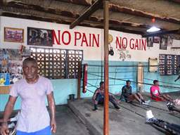boxer in ghana near ring containing workout