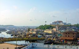 Fishing harbor in Elmina with Ft San Jago in background