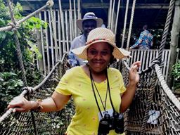 guest on rainforest canopy walkway at Kakum National Park