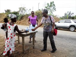 Guest buying palm wine