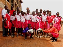 Gift of football equipment to a local school in Ghana