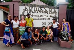 guests posing in front of entrance to Manhyia Palace 