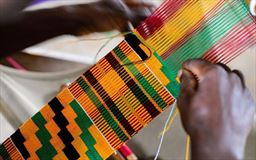 Kente cloth being woven by hand