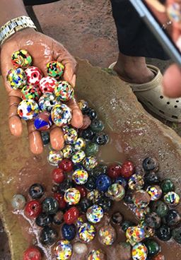 freshly made glass beads in Ghana