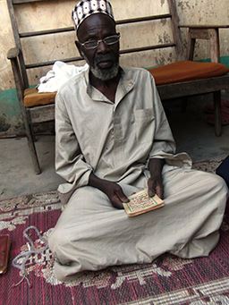 Man at prayers in northern Ghana