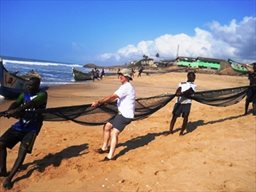 Men pulling fishing net