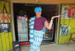 woman posing in Kente cloth in Ghana