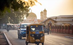 Tamale Central Mosque with tricycle in foreground