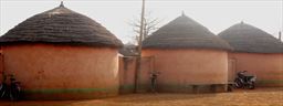 conical thatch-roof buildings in Yendi
